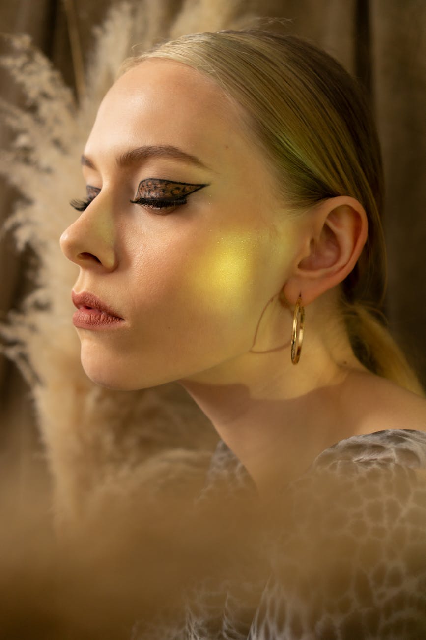 sensual woman with bright makeup and closed eyes